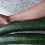 Arm mit Gurke
